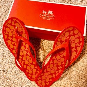 Coach red/orange flip flops Size 7